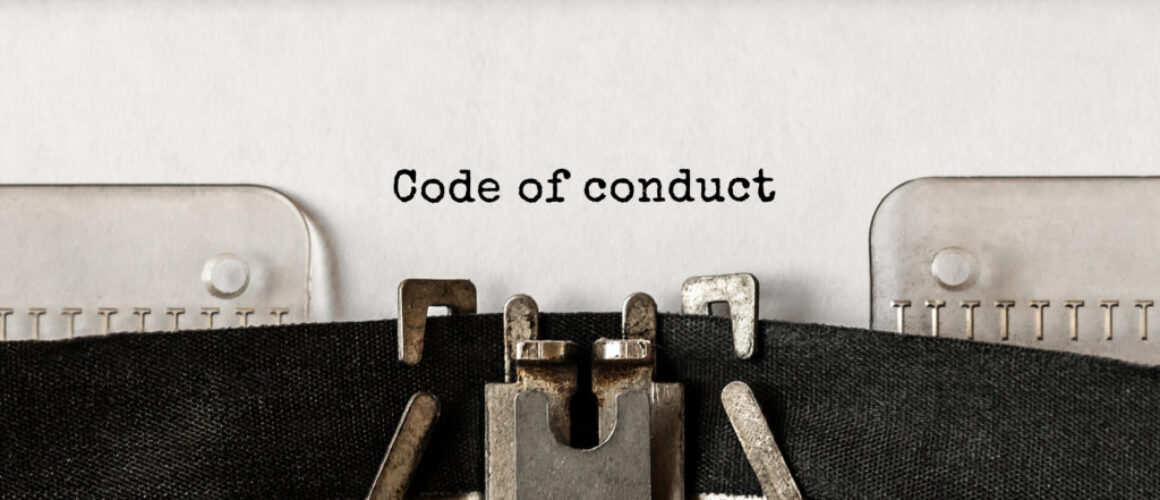 Text Code of conduct typed on retro typewriter